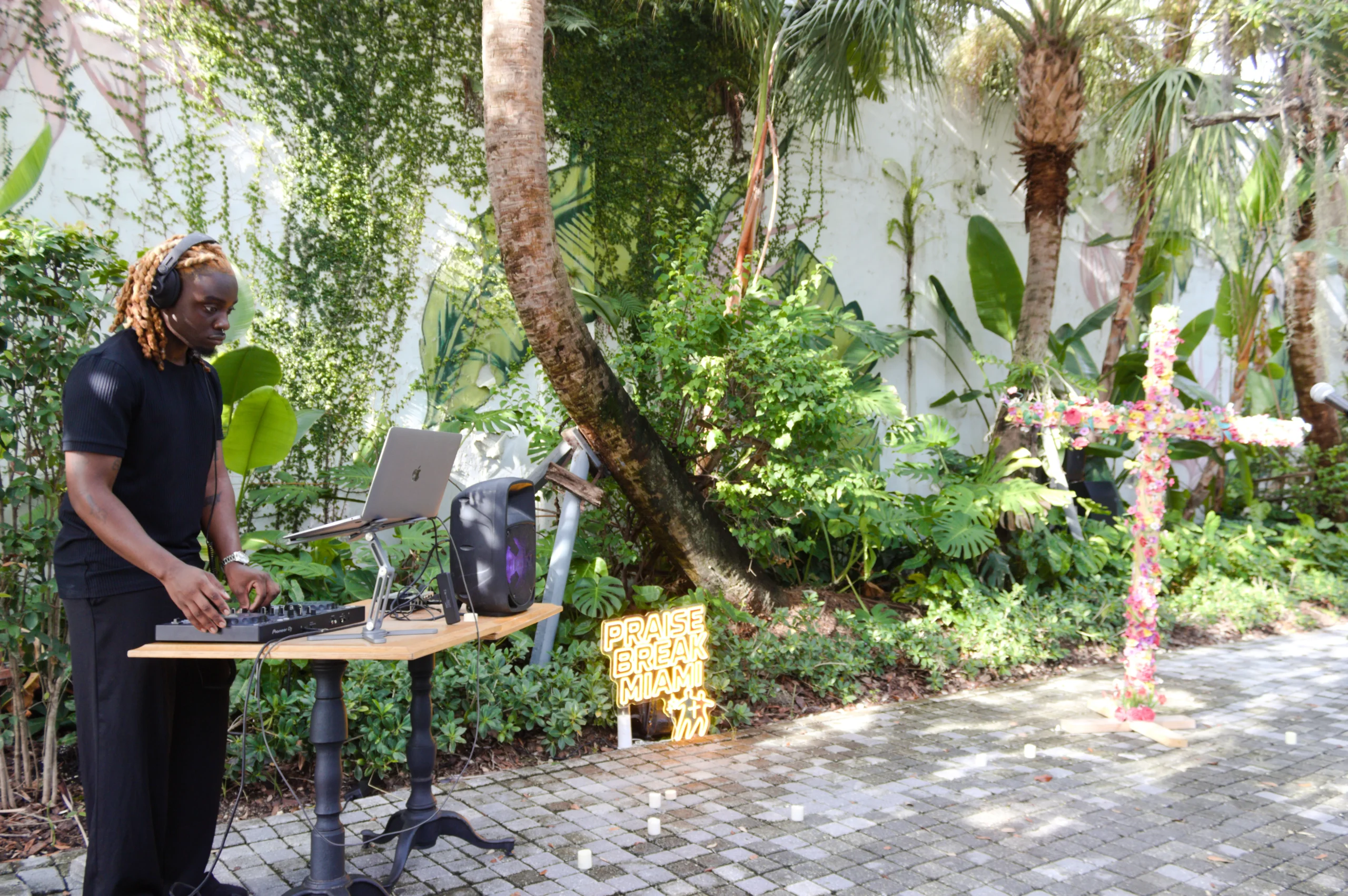 DJ playing a worship set in the Praise Break garden